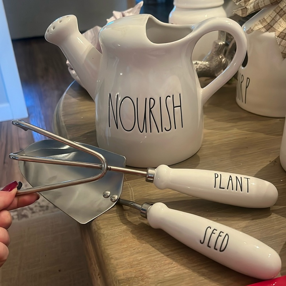 Rae Dunn watering can and tools shovel and rake